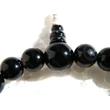 21 szemes onyx mala, karmala, csukló mala, gumis, fehér fém díszítő szemmel és onyx guru szemmel