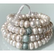 tenyesztett-gyongy-mala-smaragd-holdko-guru-108-szem-68cm