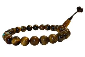 Tigrisszem karmala 21, szemes tibeti osztóval, 18 cm kerületű