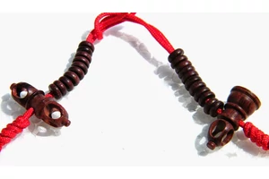 Rózsafa számláló dordzse és csengő szimbólummal