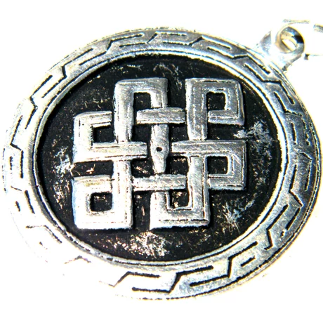 Végtelen csomó medál belül tibeti Om jel fehér fémből